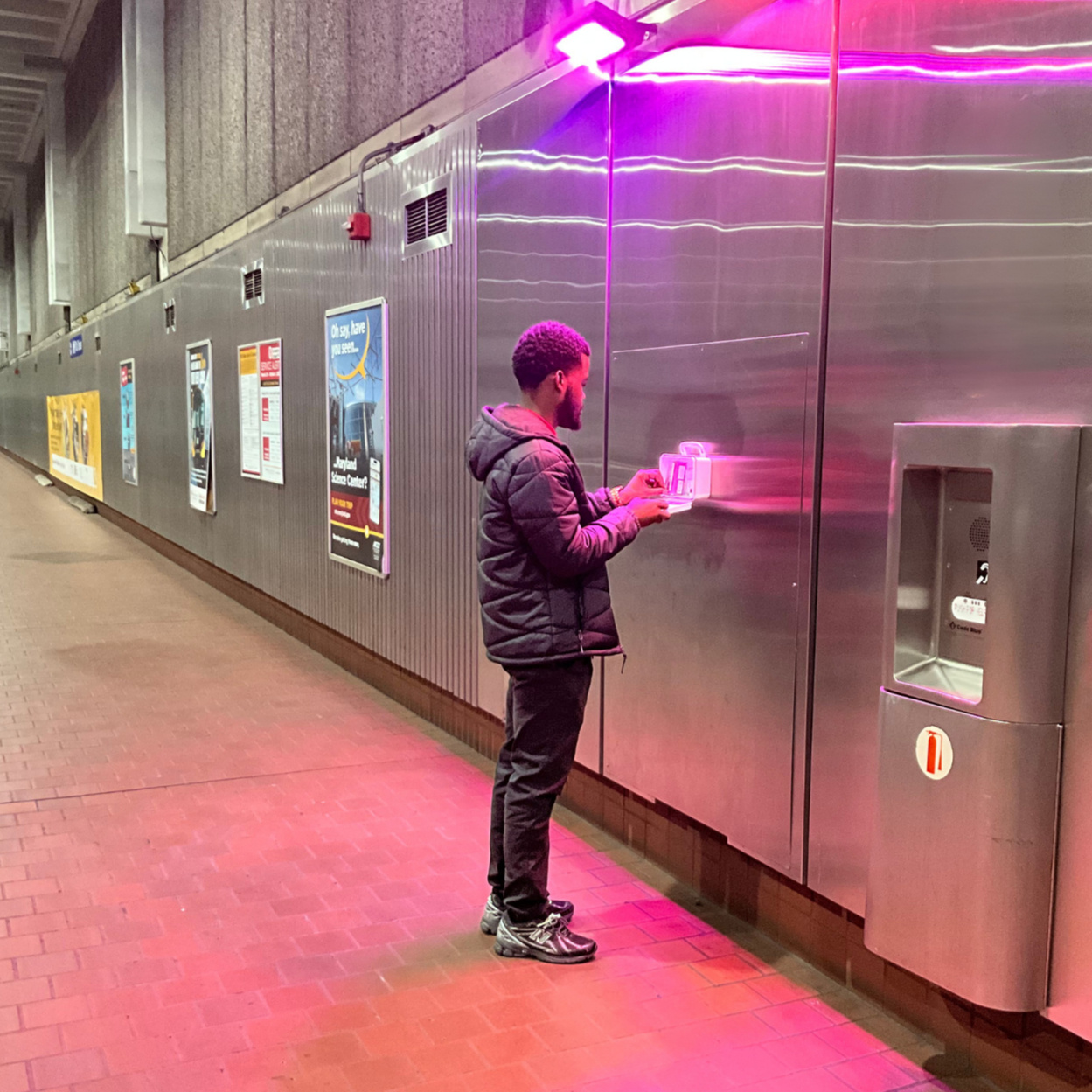 Sean Craig (CPRS), Installing ONEbox at Upton Subway Station.